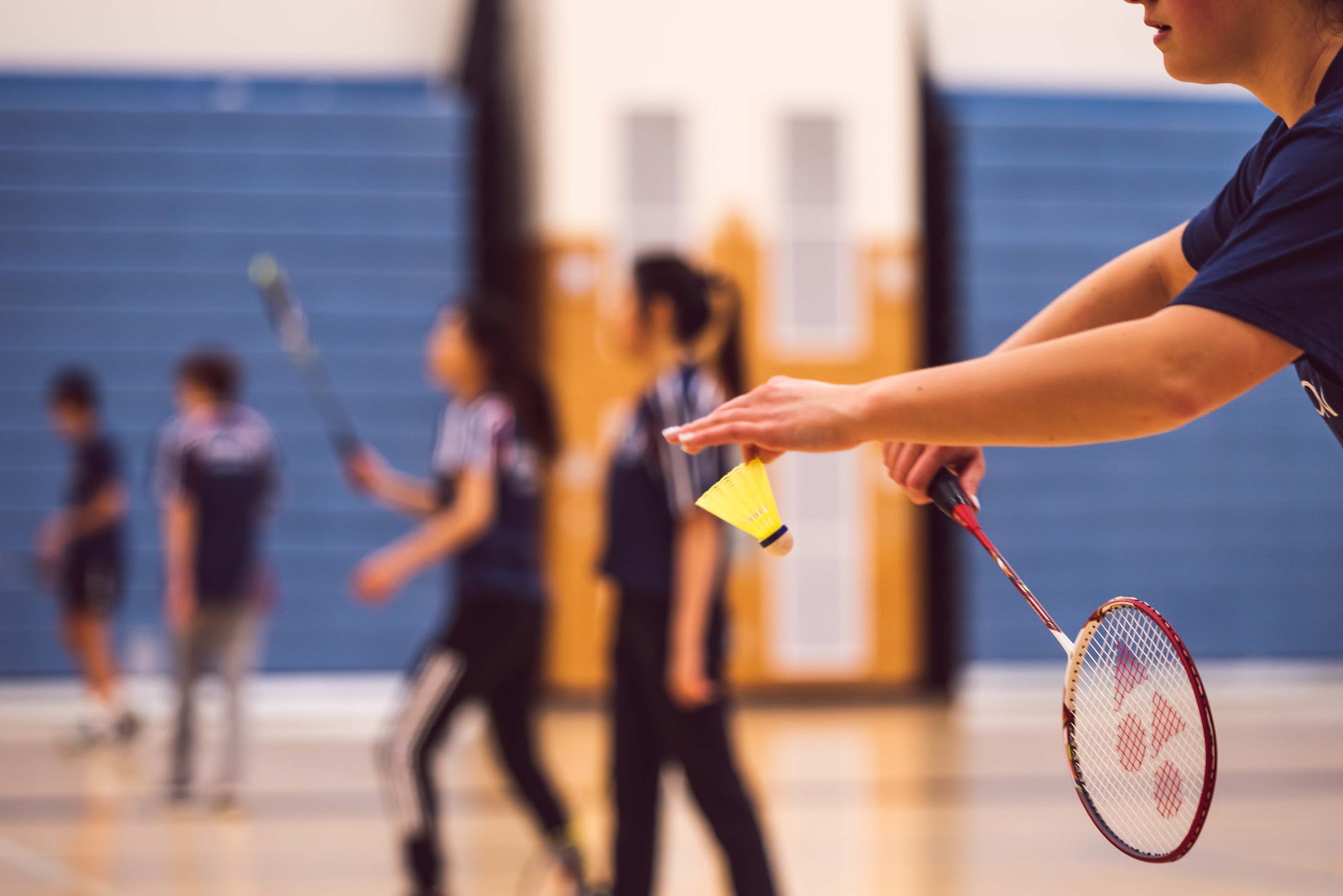 people playing badminton